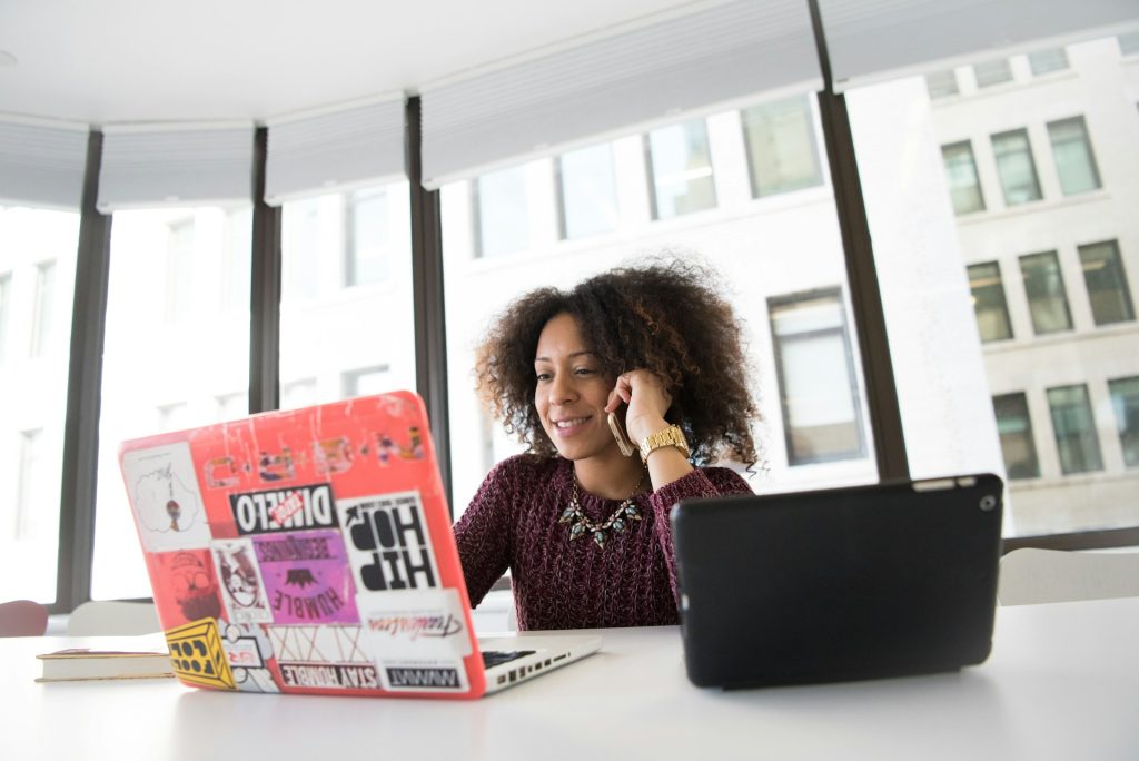 Web Designer at work in front of a laptop